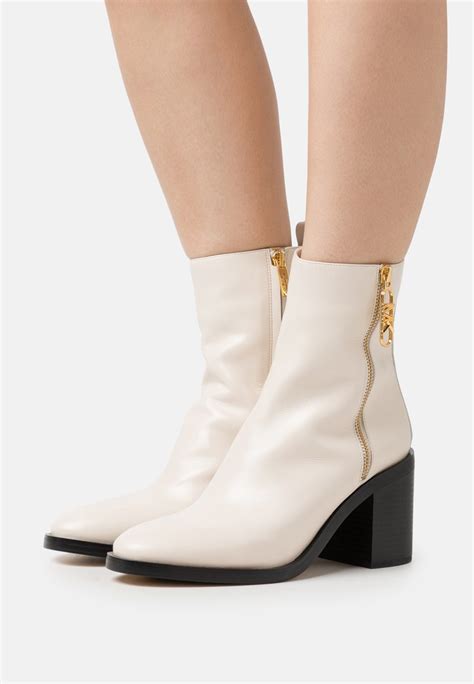 michael kors cream boots|michael kors men's boots.